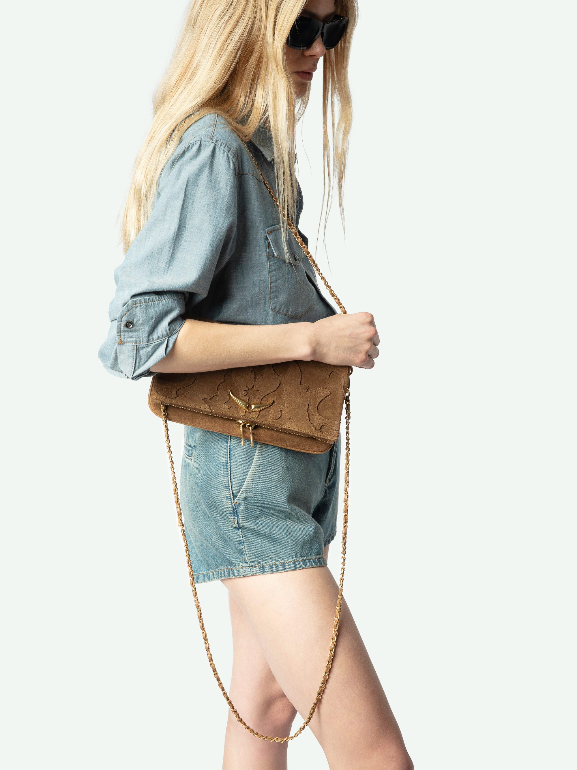 Rock Suede Clutch - Western suede leather clutch with double chain and wing signatures.